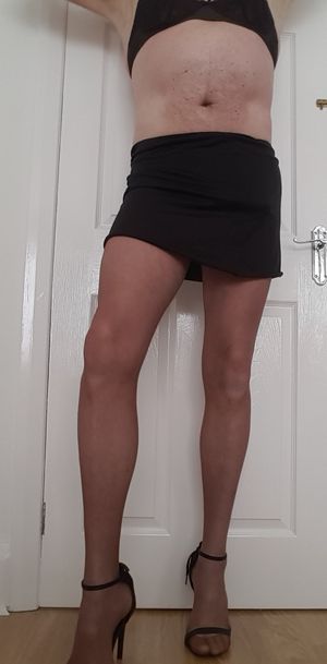 Pantyhose and short skirt crossdresser