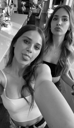 Blonde & brunette selfie tongue out