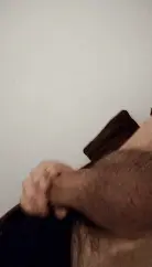 Stroking my strong hard dick with the reverse grip