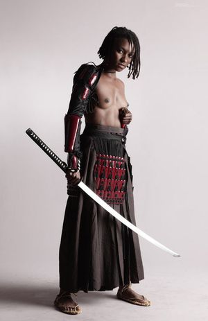 Beautiful Black Queen dressed as a Samurai