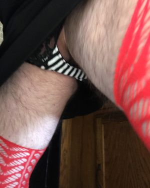 Panty peek in my short black skirt