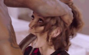 Gorgeous slut getting face fucked by a big black cock