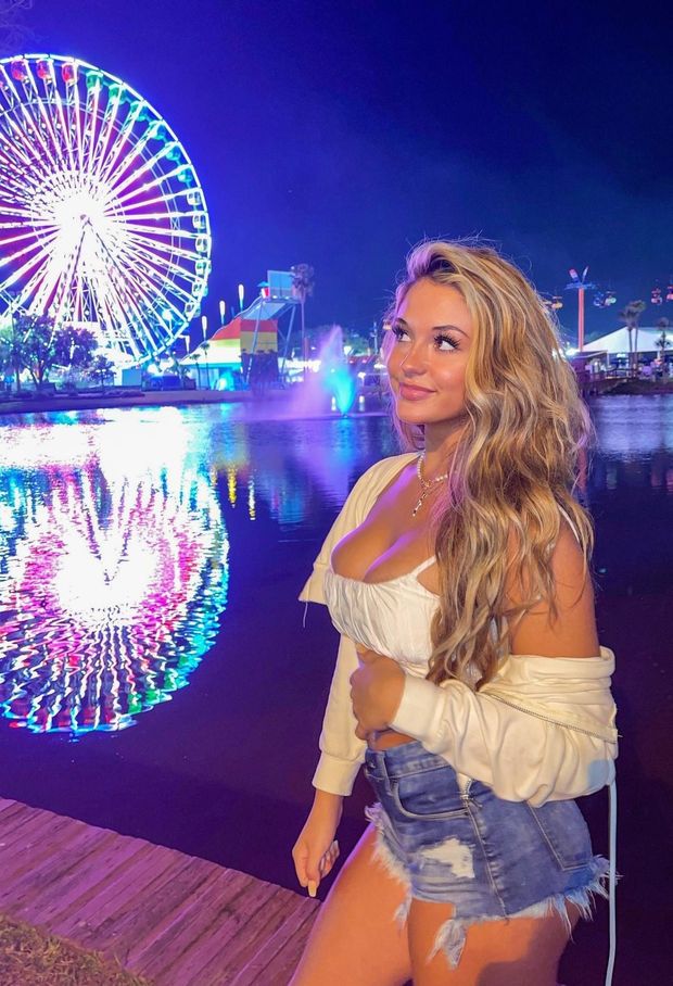 her top comes off at the top of the ferris wheel and i am sucking those tits