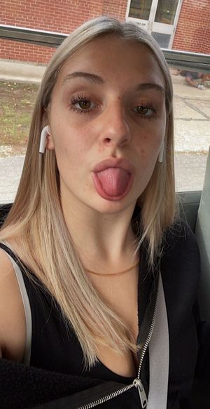 Keyra selfie tongue out sneaky cleavage