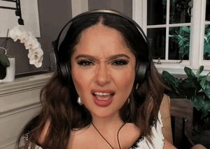 She looks surprised.