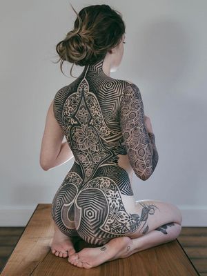 Tattoos - extensive black line work