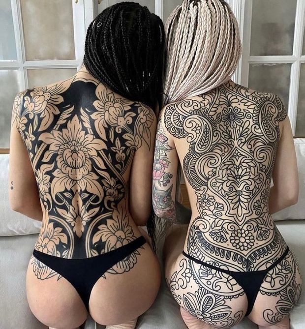 Tattoos - black line back pieces