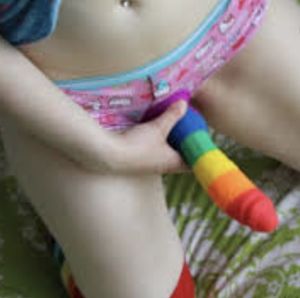 She’s a woman, you’re a man so sucking her cock is straight