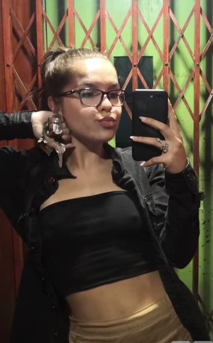 Slut with glasses showing off her nipples