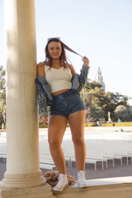 Cute and round with white converse and shorts