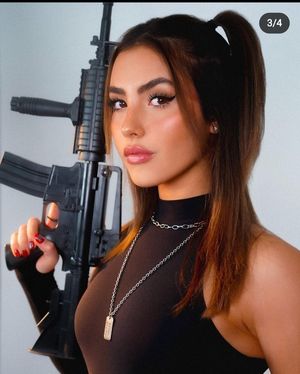 Sexy woman with gun
