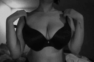Nerdydirtyandcurvy removing her bra