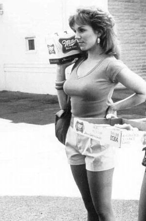 Marilu in tight curve hugging top