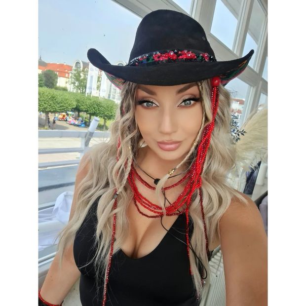 Cleo cowgirl with big tits