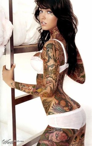 Gorgeous Tattooed Brunette