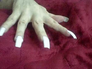Displaying white nails.