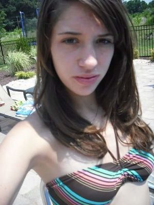 Sexy lil teenslut cocktease Emily Fink poses in a bikini