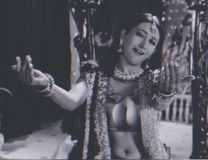 Karishma Inviting & showing her deep Navel and sexy Cleavage