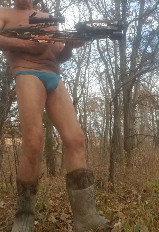 Hunting in blue bulging thong