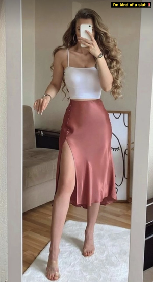 Hot wife with long legs takes a selfie.