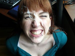 Filthy redhead's sperm glazed face