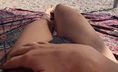 Shaved pussy exposed at the beach