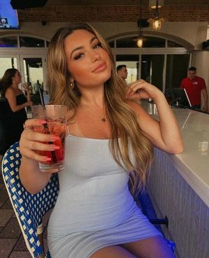 Sexy girlfriend enjoying a cocktail