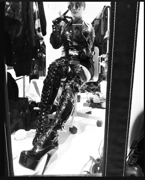 bondage babe in latex suite and high heels