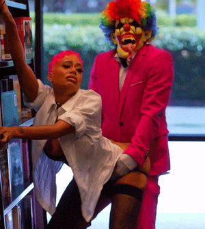 Slut fucked by clown in public