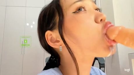 babe sucking on a dildo