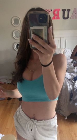 Brunette selfie blue top cleavage