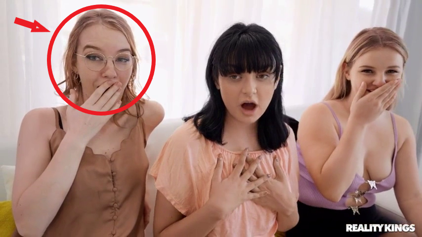 Who is the hottie with glasses with red circle & red arrow? (Realitykings)