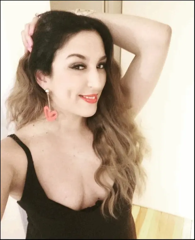 Hot Latina with big cleavage.