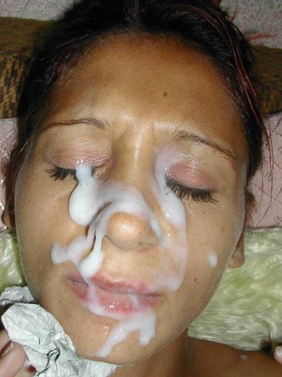 Sexy milf's face coated with sperm