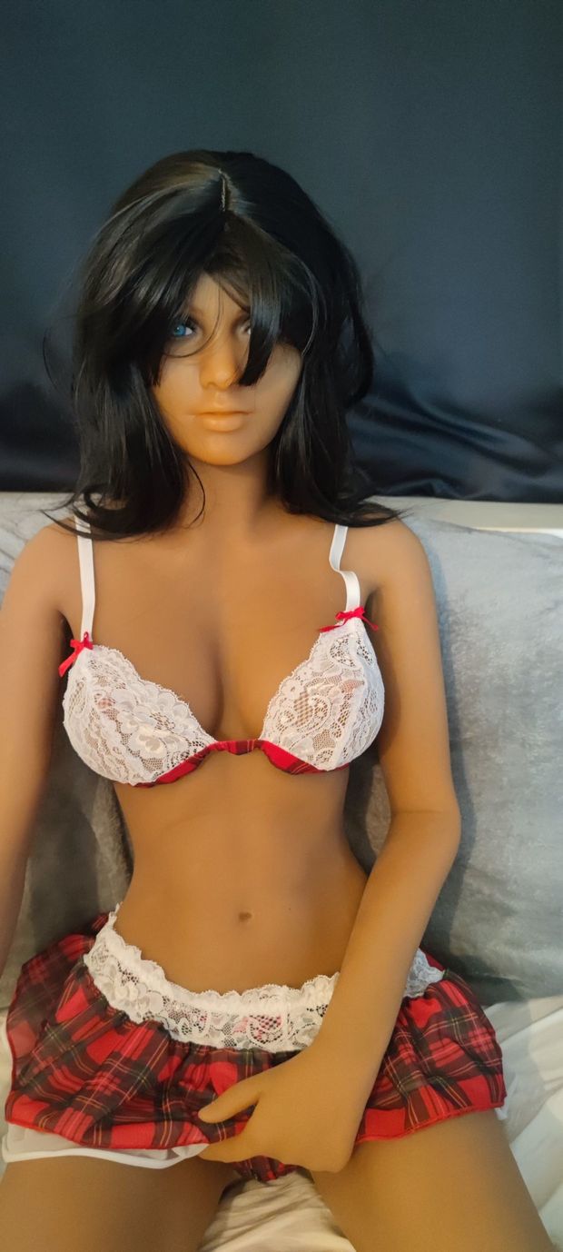 Sexdoll Sofia up-skirt on bed 02