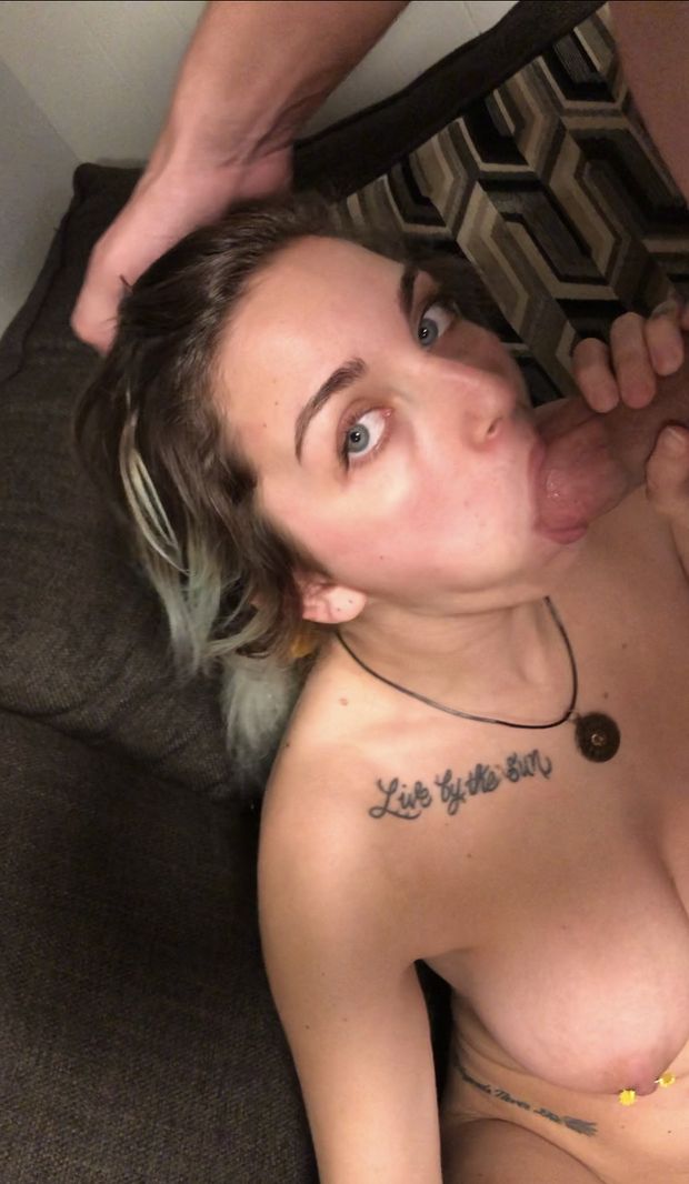 Amateur brunette with a tattoo and pierced-nipples and cock in her mouth