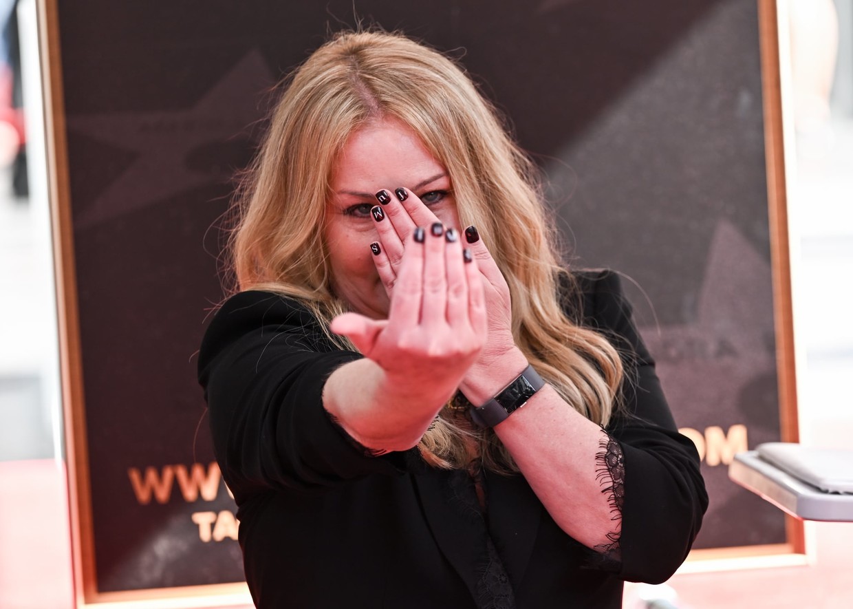 Despite breaking down, she is showing them off in resistance & defiance with the good fight.