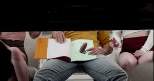 Sharing a handjob under the table