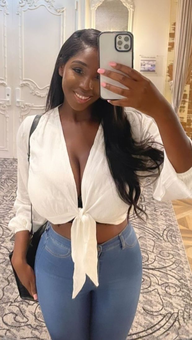 Ellie Mae white top selfie