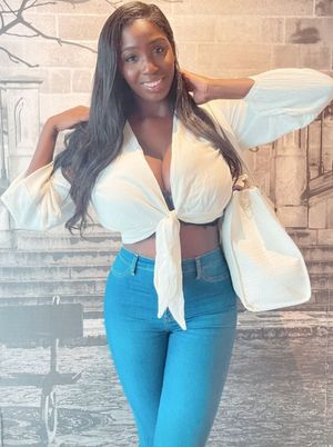 Ellie Mae white top hands up