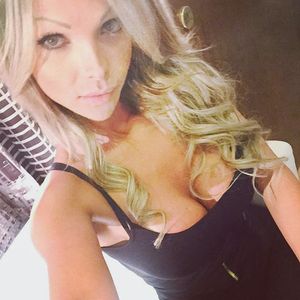 Brazilian blonde Carla Novaes cleavage selfie