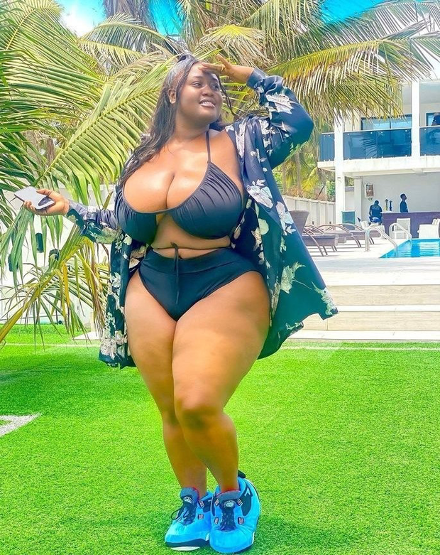 BBW in a bikini and sneakers