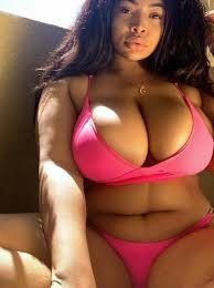 Candice Kelly in a Pink bikini