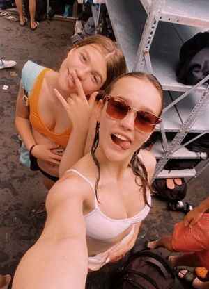 Teen selfie in front of shelving