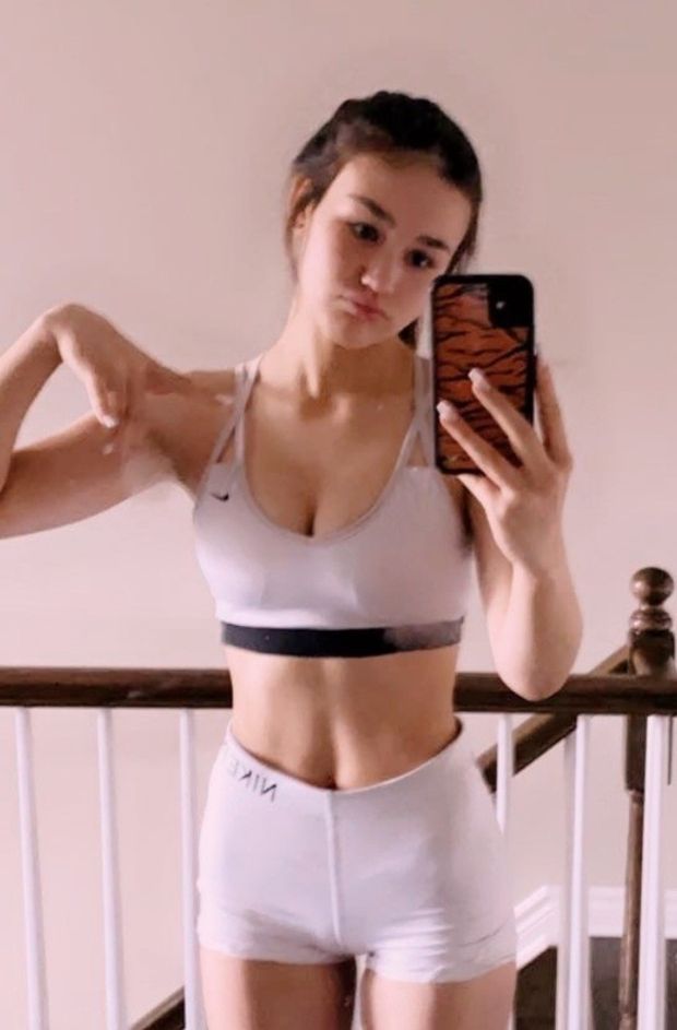 Selfie in two-piece athletic wear