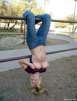Upside down blonde flashing tits