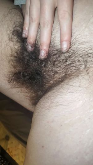Wife plays with her bush
