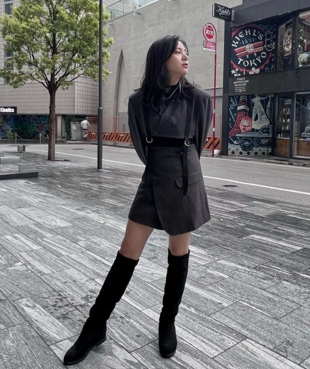 Beautiful asian in boots