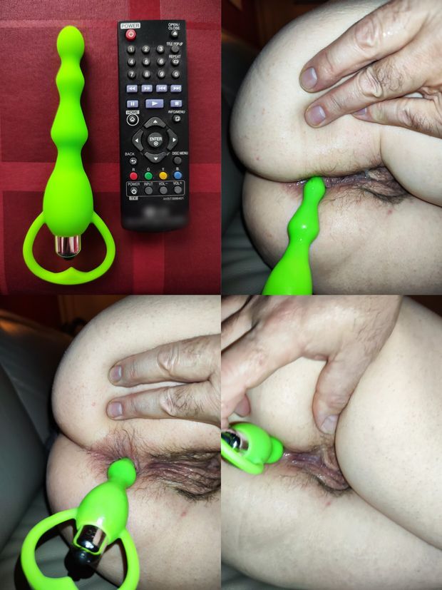 Long gode dans son cul