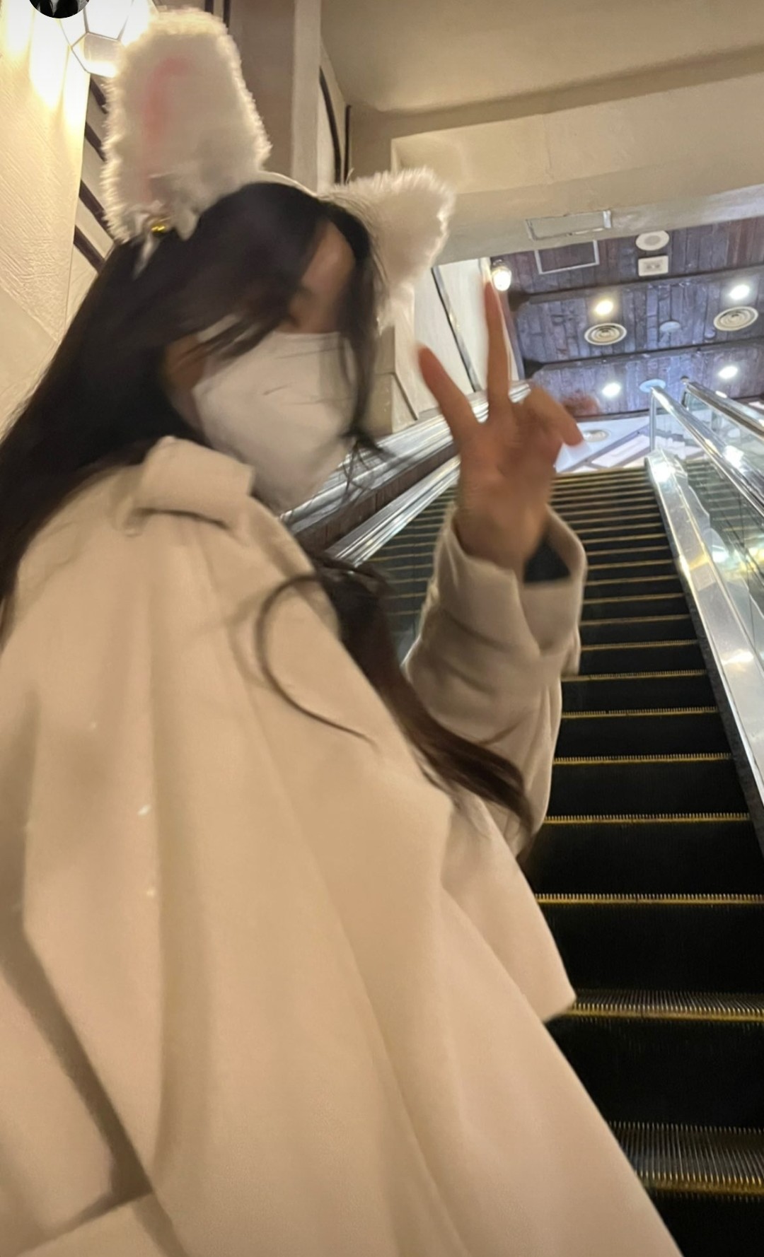 Pretty asian on the escalator